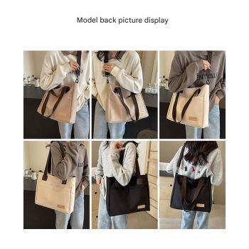 Stylish white canvas tote bag with detachable shoulder strap