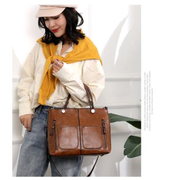 Versatile Brown Tote with Detachable Strap - Ideal for Travel